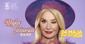 Na fioletowym tle widoczna głowa dojrzałej kobiety. Kobieta ma blond włosy, a na nich fioletowy kapelusz. Prawe oko ma otwarte, lewe zamknięta.